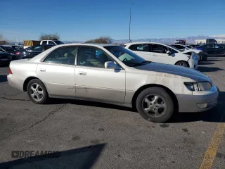 1999 Lexus ES 300 z VIN JT8BF28G4X5060914, wystawiony jako Copart lot #45912725 z przebiegiem 197 401 mil mil oraz Szkoda całkowita • Salvage title. Historia ofert i sprzedaży dostępna na DreamBid. Obrazek 4.