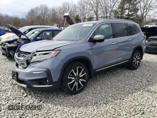 2022 Honda Pilot Elite z VIN 5FNYF6H02NB054434, wystawiony jako Copart lot #48578595 z przebiegiem 11 200 mil mil oraz Szkoda całkowita • Salvage title. Historia ofert i sprzedaży dostępna na DreamBid. Obrazek 1.
