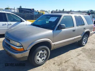 2002 Chevrolet Blazer LS z VIN 1GNDT13W52K213071, wystawiony jako IAAI lot #41336010 z przebiegiem 157 758 mil mil oraz . Historia ofert i sprzedaży dostępna na DreamBid. Obrazek 2.
