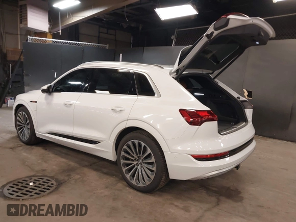 2019 Audi e-tron Prestige with VIN WA1VABGE3KB012371, listed as a IAAI auction lot 42314860 with 41,269 mi miles and . Bid and sale history available at DreamBid. Image 3.