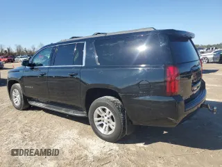 2020 Chevrolet Suburban LS with VIN 1GNSCGKC9LR126672, listed as a Copart auction lot 43216245 with 132,775 mi miles and Salvage title. Bid and sale history available at DreamBid. Image 2.