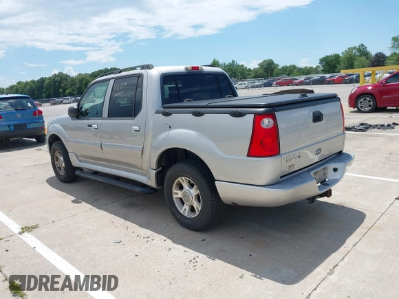 2004 Ford Explorer Sport Trac XLS z VIN 1FMZU77K64UA98358, wystawiony jako IAAI lot #42637743 z przebiegiem 158 359 mil mil oraz . Historia ofert i sprzedaży dostępna na DreamBid. Obrazek 3.