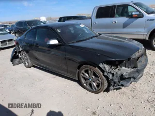 2015 BMW 2 Series M235i xDrive with VIN WBA1J9C5XFV371057, listed as a Copart auction lot 51994765 with 189,788 mi miles and Salvage Title. Bid and sale history available at carsss.com. Image 4.