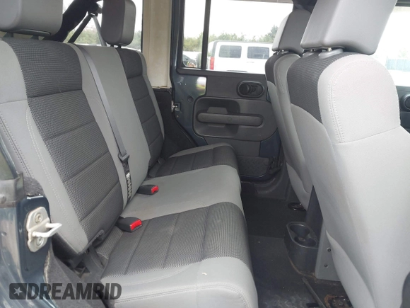 2007 Jeep Wrangler Unlimited X with VIN 1J4GA39137L101321, listed as a IAAI auction lot 42095445 with 243,583 mi miles and . Bid and sale history available at DreamBid. Image 8.