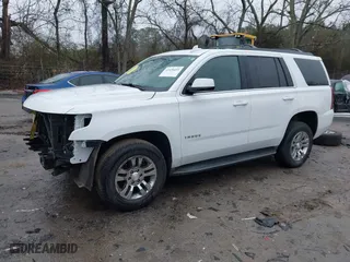 2017 Chevrolet Tahoe LS with VIN 1GNSCAKC3HR265961, listed as a IAAI auction lot 41426651 with 117,331 mi miles. Bid and sale history available at carsss.com. Image 2.