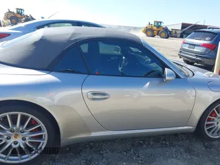 2006 Porsche 911 Carrera S z VIN WP0CB29976S766616, wystawiony jako IAAI lot #42119525 z przebiegiem 57 164 mil mil oraz . Historia ofert i sprzedaży dostępna na DreamBid. Obrazek 13.