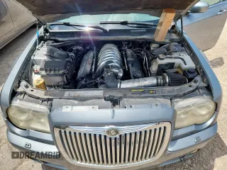 2006 Chrysler 300 C SRT-8 z VIN 2C3LA73W36H377854, wystawiony jako Copart lot #61070615 z przebiegiem 260 778 mil mil oraz Czysty tytuł • Clean title. Historia ofert i sprzedaży dostępna na DreamBid. Obrazek 11.