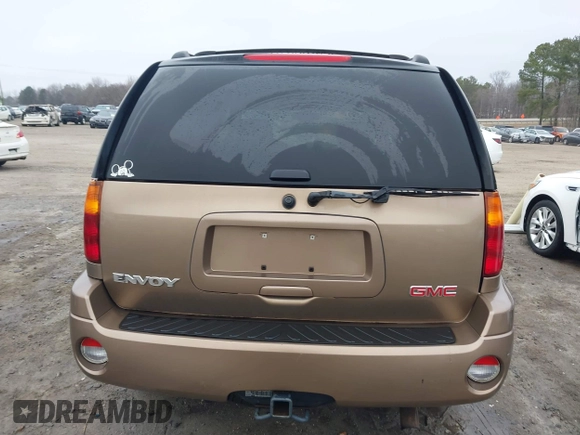 2003 GMC Envoy SLE with VIN 1GKDT13S332264984, listed as a IAAI auction lot 41523191 with 227,004 mi miles. Bid and sale history available at carsss.com. Image 16.