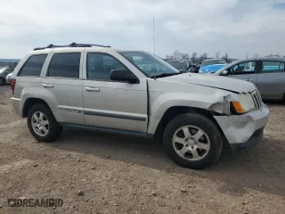 2009 Jeep Grand Cherokee Laredo with VIN 1J8GR48K89C551203, listed as a Copart auction lot 49252125 with 122,071 mi miles and Salvage Title. Bid and sale history available at carsss.com. Image 4.
