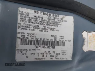 2006 Ford Taurus with VIN 1FAHP56U96A216511, listed as a IAAI auction lot 41449371 with Not provided miles and . Bid and sale history available at DreamBid. Image 9.
