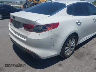 2018 Kia Optima S with VIN 5XXGT4L35JG251681, listed as a IAAI auction lot 42302319 with 154,612 mi miles and . Bid and sale history available at DreamBid. Image 6.