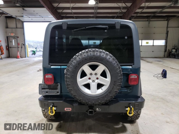 1998 Jeep Wrangler SE with VIN 1J4FY29P5WP742855, listed as a Copart auction lot 52818845 with 196,902 mi miles and Clean Title. Bid and sale history available at carsss.com. Image 6.