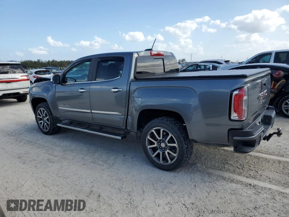 2021 GMC Canyon 4WD Denali with VIN 1GTG6EEN7M1281163, listed as a Copart auction lot 78996944 with 49,299 mi miles and Non Repairable. Bid and sale history available at carsss.com. Image 2.
