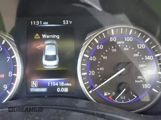 2014 Infiniti Q50 Premium with VIN JN1BV7AR9EM701624, listed as a IAAI auction lot 41711699 with 119,418 mi miles. Bid and sale history available at carsss.com. Image 7.