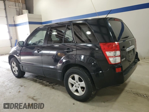 2012 Suzuki Grand Vitara Premium z VIN JS3TD0D66C4100814, wystawiony jako Copart lot #89250025 z przebiegiem 102 381 mil mil oraz Szkody całkowita. Historia ofert i sprzedaży dostępna na DreamBid. Obrazek 2.