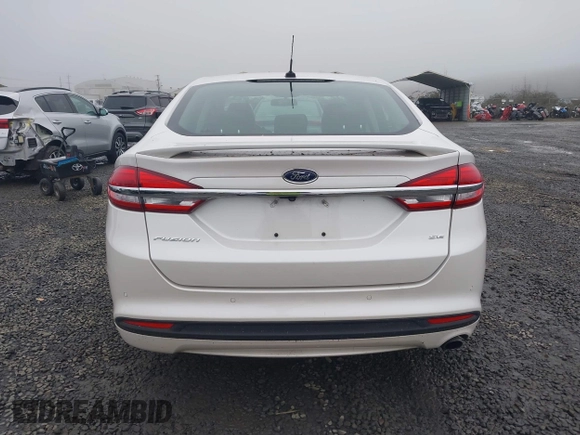 2017 Ford Fusion SE z VIN 3FA6P0H71HR201799, wystawiony jako IAAI lot #41346018 z przebiegiem 51 126 mil mil oraz . Historia ofert i sprzedaży dostępna na DreamBid. Obrazek 16.