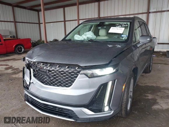 2022 Cadillac XT6 Premium Luxury z VIN 1GYKPDRS1NZ108012, wystawiony jako IAAI lot #41178333 z przebiegiem 83 987 mil mil oraz . Historia ofert i sprzedaży dostępna na DreamBid. Obrazek 17.