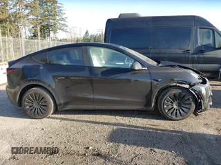 2023 Tesla Model Y Long Range z VIN 7SAYGDEE9PF637042, wystawiony jako IAAI lot #41969086 z przebiegiem 25 524 mil mil oraz . Historia ofert i sprzedaży dostępna na DreamBid. Obrazek 13.