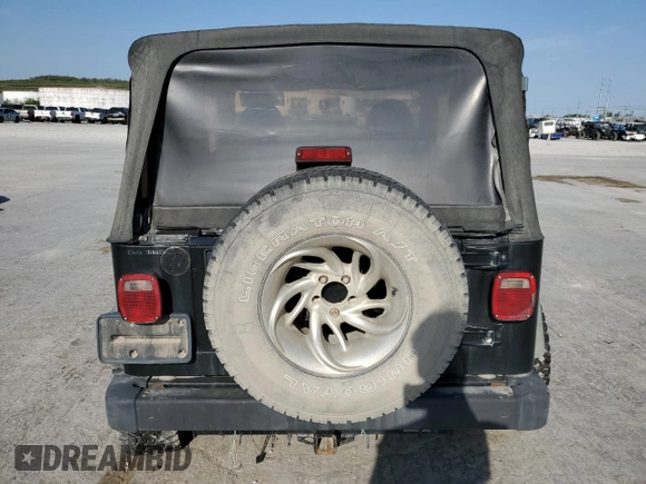 1998 Jeep Wrangler Sport with VIN 1J4FY19S1WP757593, listed as a Copart auction lot 52382945 with 230,086 mi miles and Salvage Title. Bid and sale history available at carsss.com. Image 6.