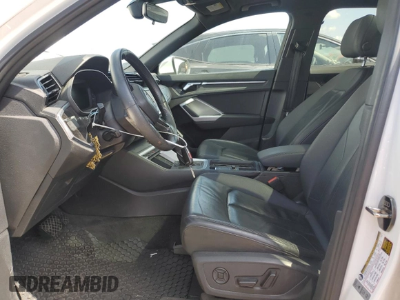 2020 Audi Q3 Premium with VIN WA1AECF32L1032479, listed as a Copart auction lot 63479405 with 94,368 mi miles and Clean title. Bid and sale history available at DreamBid. Image 7.