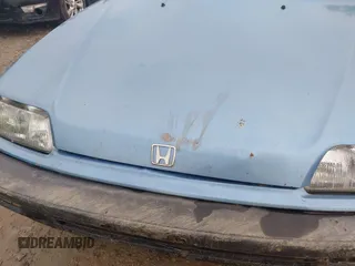 1991 Honda Civic z VIN 2HGED634XMH576080, wystawiony jako IAAI lot #42126557 z przebiegiem 271 729 mil mil oraz . Historia ofert i sprzedaży dostępna na DreamBid. Obrazek 14.