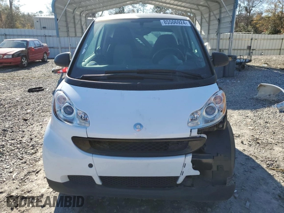 2012 Smart fortwo Pure z VIN WMEEJ3BA1CK559092, wystawiony jako Copart lot #85506924 z przebiegiem 47 806 mil mil oraz Szkoda całkowita • Salvage title. Historia ofert i sprzedaży dostępna na DreamBid. Obrazek 5.