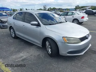 2012 Volkswagen Jetta Sedan SE w/Convenience PZEV with VIN 3VWDP7AJ5CM348310, listed as a IAAI auction lot 41439669 with 166,554 mi miles. Bid and sale history available at carsss.com. Image 1.