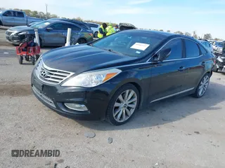 2014 Hyundai Azera Limited with VIN KMHFH4JG7EA353094, listed as a IAAI auction lot 41043222 with 184,924 mi miles and . Bid and sale history available at DreamBid. Image 17.