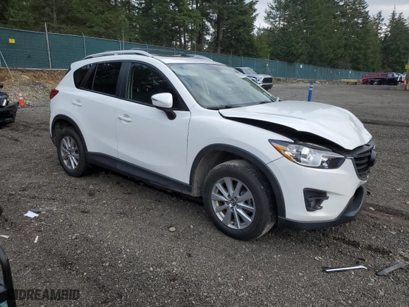 2016 Mazda CX-5 Touring with VIN JM3KE4CY5G0908092, listed as a Copart auction lot 49504015 with 126,825 mi miles and Salvage Title. Bid and sale history available at carsss.com. Image 4.