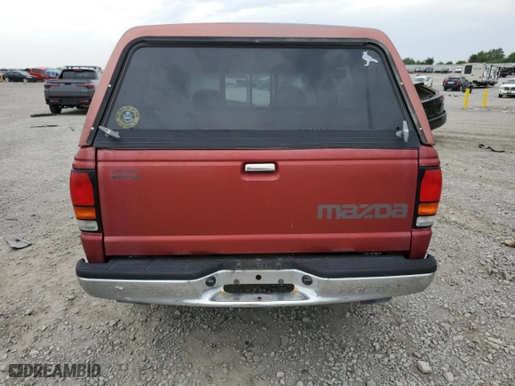 1997 Mazda B-Series 2WD Truck with VIN 4F4CR12A1VTM23469, listed as a Copart auction lot 63211114 with 148,272 mi miles and Salvage Title. Bid and sale history available at carsss.com. Image 6.