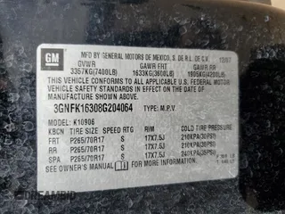 2008 Chevrolet Suburban LTZ z VIN 3GNFK16308G204064, wystawiony jako Copart lot #54522915 z przebiegiem Nie podano mil oraz Szkoda całkowita • Salvage title. Historia ofert i sprzedaży dostępna na DreamBid. Obrazek 13.
