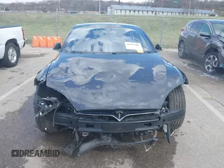 2016 Tesla Model S 70 with VIN 5YJSA1E14GF157118, listed as a IAAI auction lot 41794381 with 53,651 mi miles and . Bid and sale history available at DreamBid. Image 13.