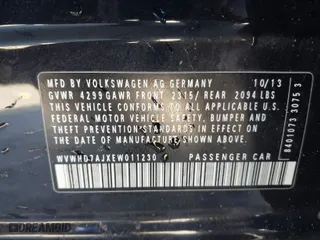 2014 Volkswagen GTI Driver's Edition with VIN WVWHD7AJXEW011230, listed as a IAAI auction lot 41600806 with 124,498 mi miles. Bid and sale history available at carsss.com. Image 9.