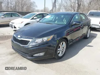 2013 Kia Optima EX z VIN 5XXGN4A7XDG198853, wystawiony jako IAAI lot #41807485 z przebiegiem 87 466 mil mil oraz . Historia ofert i sprzedaży dostępna na DreamBid. Obrazek 2.