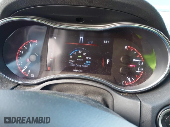 2015 Dodge Durango SXT with VIN 1C4RDJAG4FC784865, listed as a IAAI auction lot 40872452 with 145,877 mi miles and . Bid and sale history available at carsss.com. Image 7.