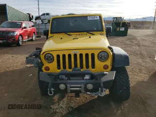 2009 Jeep Wrangler Rubicon with VIN 1J4GA64109L707008, listed as a Copart auction lot 87492674 with 157,104 mi miles and Salvage Title. Bid and sale history available at DreamBid. Image 5.