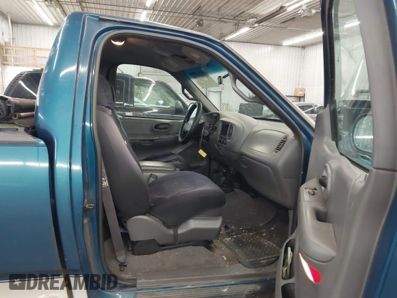 2000 Ford F-150 XL with VIN 1FTRF18W2YNC32960, listed as a IAAI auction lot 42487779 with 126,416 mi miles and . Bid and sale history available at DreamBid. Image 5.