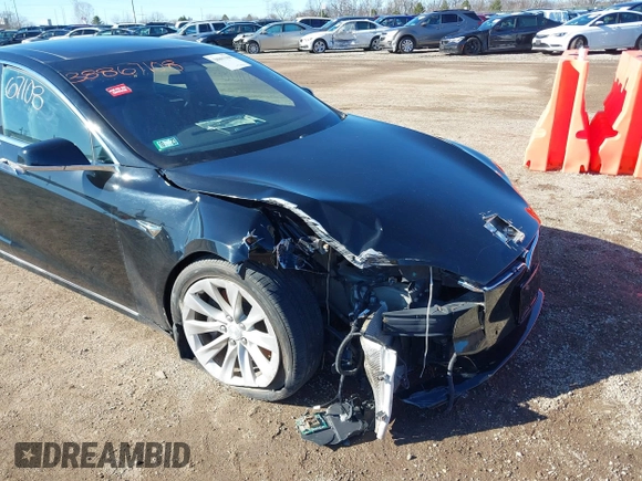 2016 Tesla Model S 90D with VIN 5YJSA1E22GF174301, listed as a IAAI auction lot 38867108 with 60,715 mi miles and . Bid and sale history available at DreamBid. Image 6.