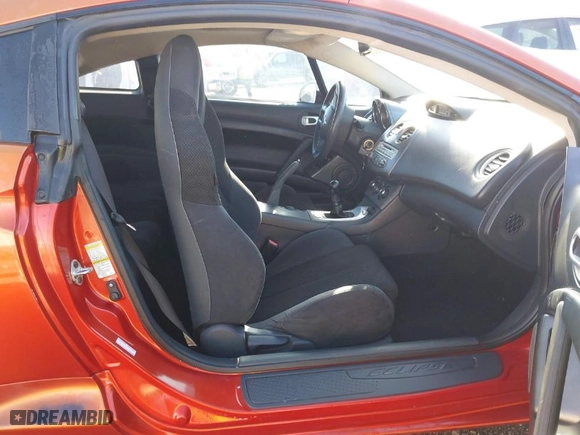 2007 Mitsubishi Eclipse GS with VIN 4A3AK24FX7E044090, listed as a IAAI auction lot 41755462 with 113,636 mi miles. Bid and sale history available at carsss.com. Image 5.