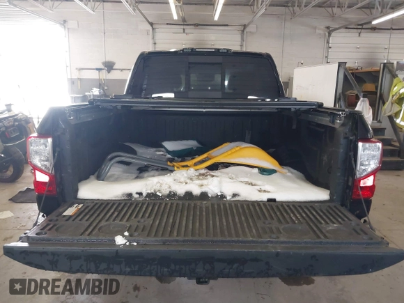 2021 Nissan Titan Pro-4X with VIN 1N6AA1ED6MN517649, listed as a IAAI auction lot 41731345 with 71,855 mi miles and . Bid and sale history available at DreamBid. Image 16.