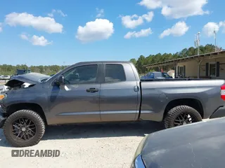 2014 Toyota Tundra 4WD Truck SR with VIN 5TFUM5F11EX055025, listed as a IAAI auction lot 41883017 with 100,565 mi miles. Bid and sale history available at carsss.com. Image 14.