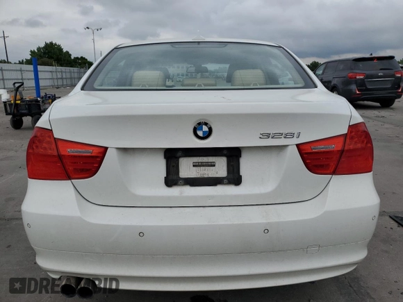 2011 BMW 3 Series 328i xDrive with VIN WBAPK7G5XBNN86258, listed as a Copart auction lot 61224485 with 202,186 mi miles and Salvage title. Bid and sale history available at DreamBid. Image 6.