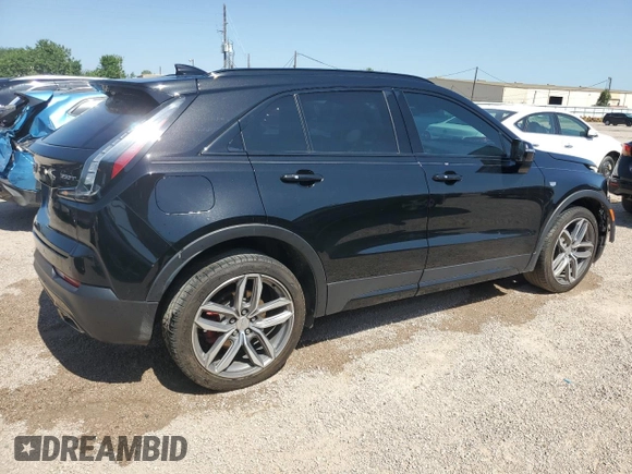 2021 Cadillac XT4 FWD Sport with VIN 1GYFZER44MF015908, listed as a Copart auction lot 52214925 with 94,079 mi miles and Clean Title. Bid and sale history available at carsss.com. Image 3.
