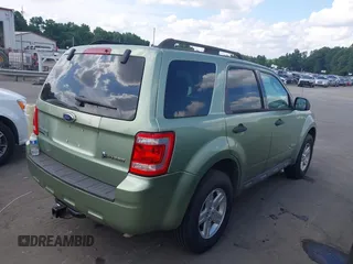2009 Ford Escape Hybrid with VIN 1FMCU49349KA35580, listed as a IAAI auction lot 42720544 with 95,630 mi miles and . Bid and sale history available at DreamBid. Image 4.