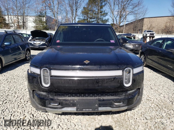 2023 Rivian R1S Adventure with VIN 7PDSGABA3PN012584, listed as a Copart auction lot 47557575 with 8,633 mi miles and Salvage Title. Bid and sale history available at carsss.com. Image 5.