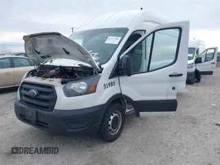 2020 Ford Transit Cargo with VIN 1FTBR3X85LKB51985, listed as a IAAI auction lot 41327206 with 206,896 mi miles and . Bid and sale history available at carsss.com. Image 6.