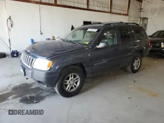 2004 Jeep Grand Cherokee Laredo z VIN 1J4GW48S14C338788, wystawiony jako Copart lot #53136715 z przebiegiem 150 352 mil mil oraz Szkody całkowita. Historia ofert i sprzedaży dostępna na DreamBid. Obrazek 1.