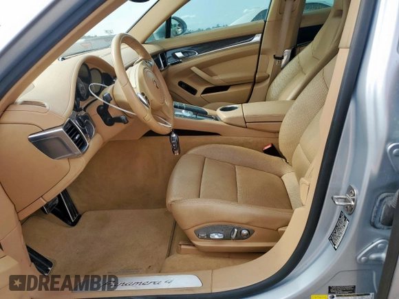 2014 Porsche Panamera с VIN WP0AA2A79EL009620, выставлен на аукционе Copart как лот 58654975 с пробегом 169 322 миль миль и Списание • Salvage title. История ставок и продаж доступна на DreamBid. Изображение 7.