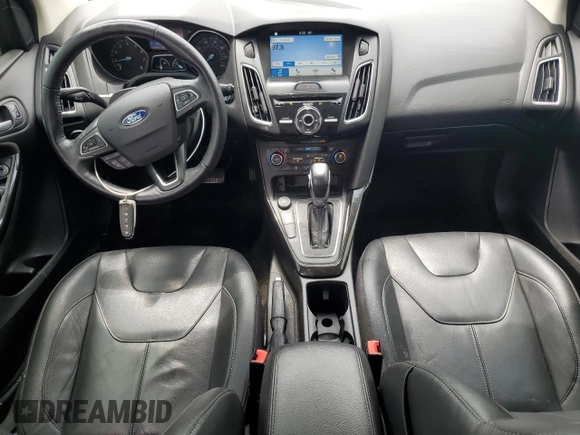 2017 Ford Focus Titanium z VIN 1FADP3N22HL307260, wystawiony jako Copart lot #61399785 z przebiegiem 103 293 mil mil oraz Szkoda całkowita • Salvage title. Historia ofert i sprzedaży dostępna na DreamBid. Obrazek 8.
