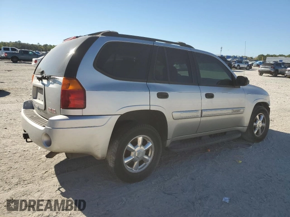 2004 GMC Envoy SLE with VIN 1GKDS13SX42374385, listed as a Copart auction lot 50150065 with 0 mi miles and Salvage Title. Bid and sale history available at carsss.com. Image 3.